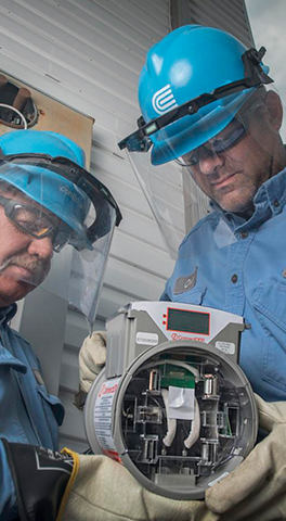 R&D / Innovation - Two ConEdison employees check a meter